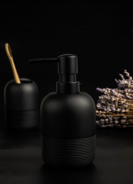 Soap dispenser with tissue